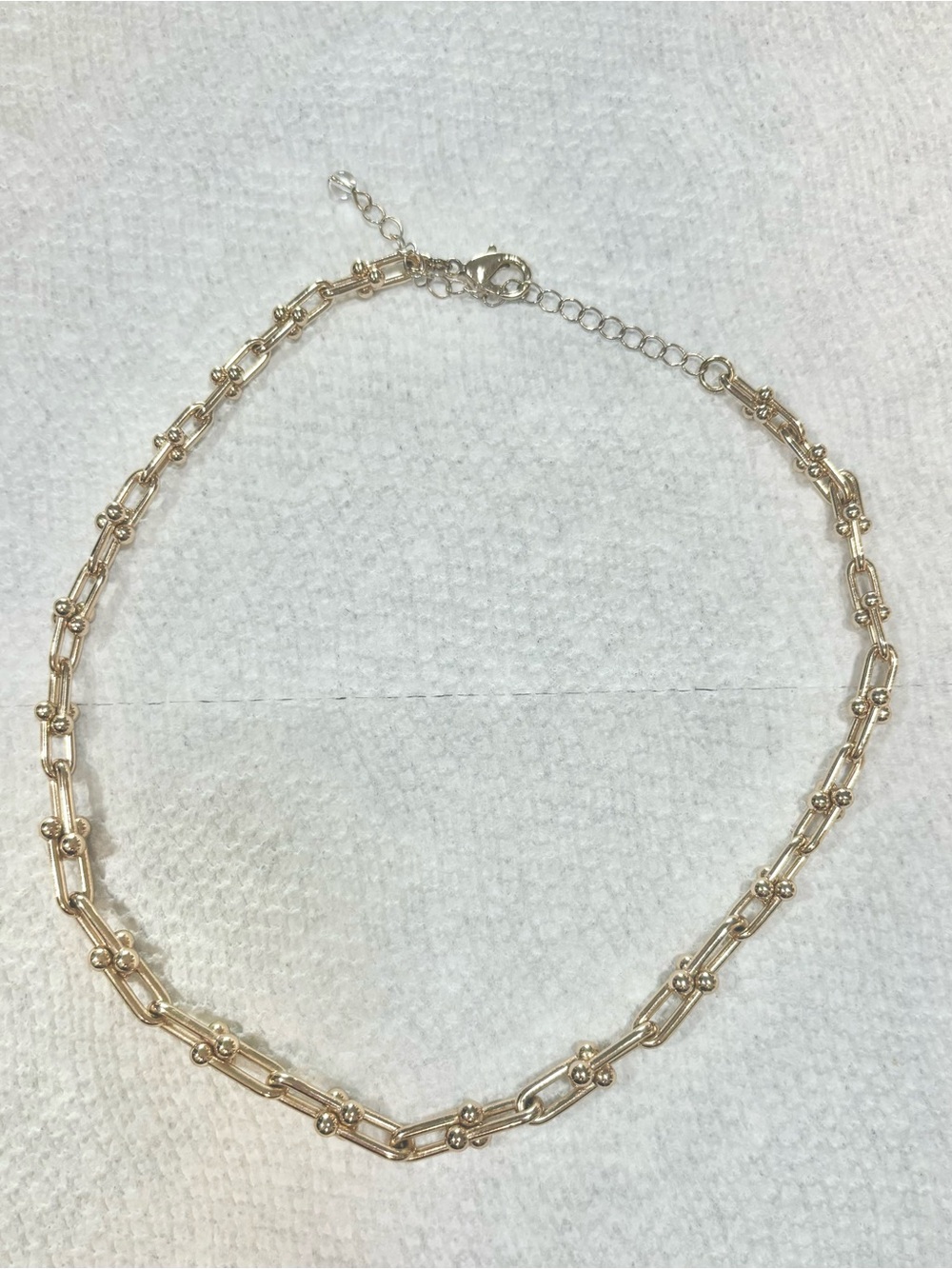 Gold interlocked necklace